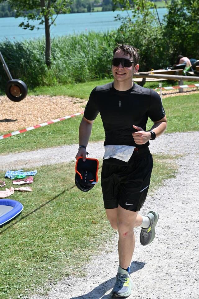 Running the final leg beside the lake